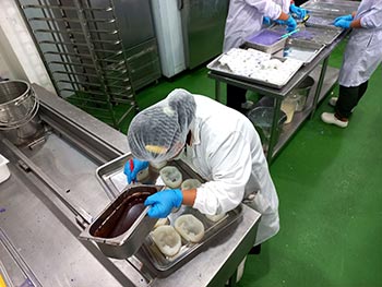 Chocolate coating applied inside the molds